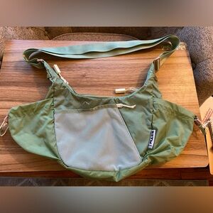 Baboon to the Moon Crescent Bag in mineral green!